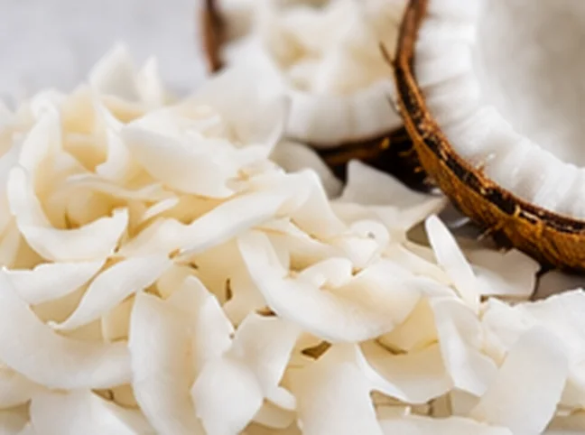White strips of dried young coconut